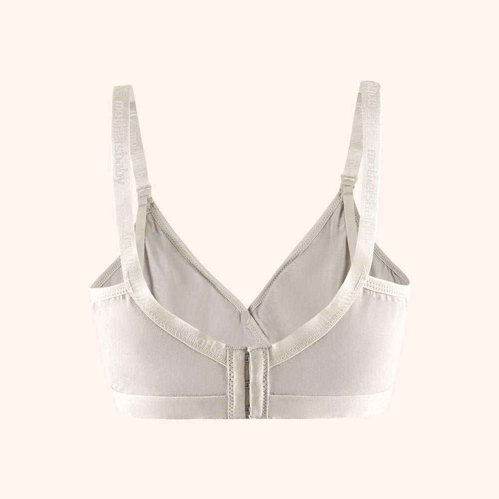 Back view of a beige bamboo bra with adjustable straps, showcasing soft texture, breathability, and eco-friendly material for comfortable wear.