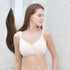 Woman wearing ONE-TOUCH AIR SILK BRA in light beige, featuring one-touch strap and wrap style, comfortable and lightweight viscose fabric.